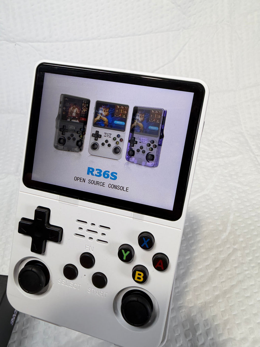 R36S handheld retro gaming console